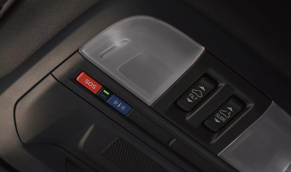 Close-up of Subaru SOS button and overhead controls
